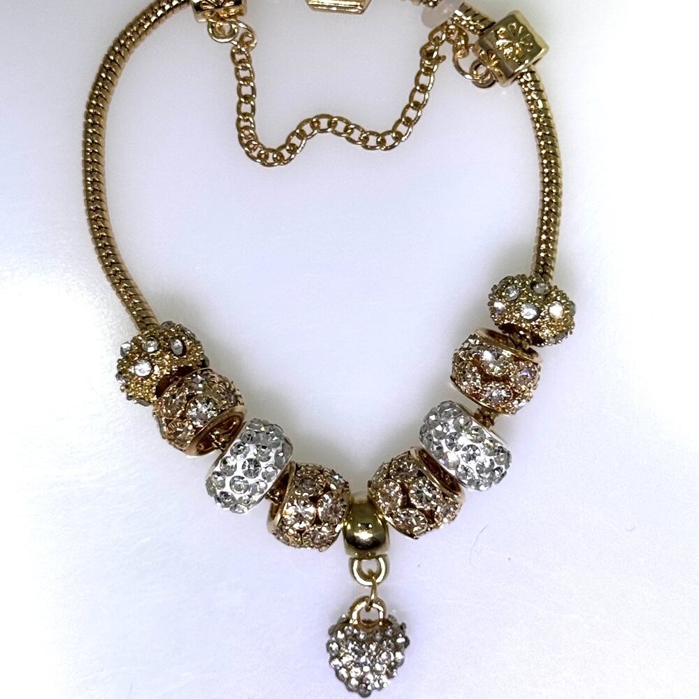 Gold tone European style slide charm bracelet, lots of bling, NWOT